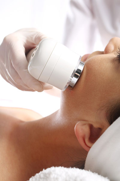 Woman receiving a clinical facial treatment