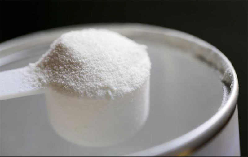 Scoop of Collagen Peptide Powder