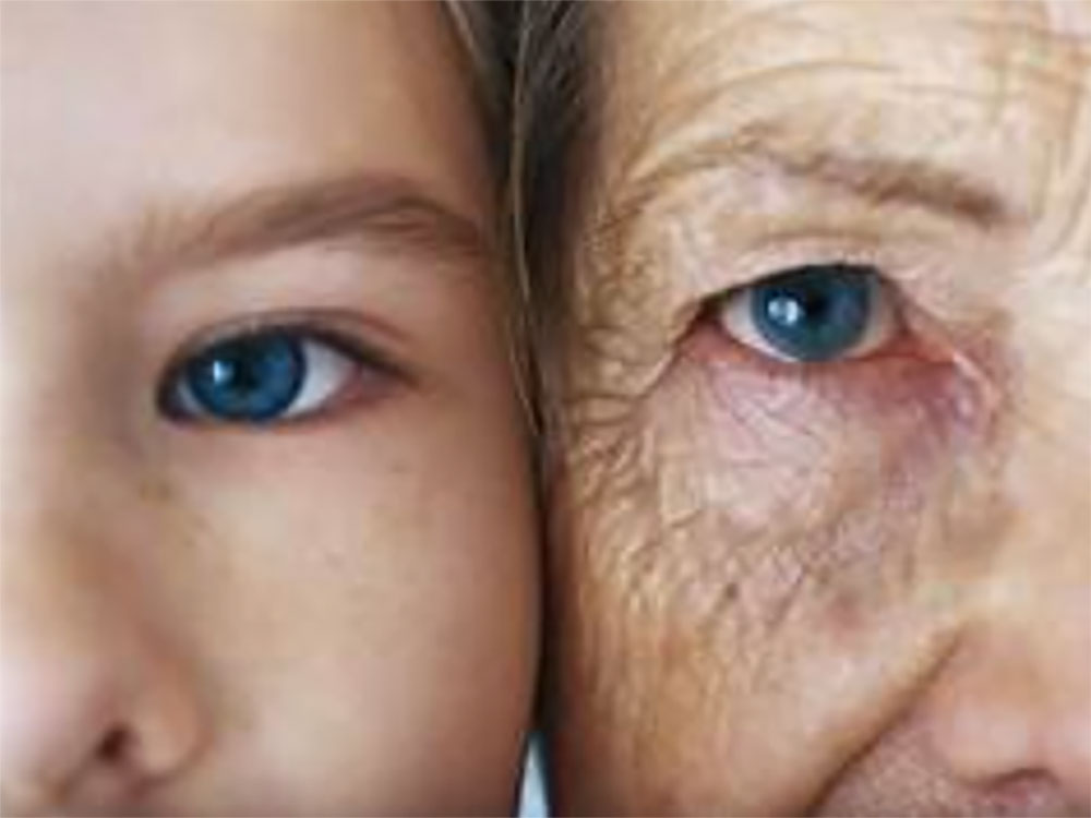 Half of a young person's face and an older person's face